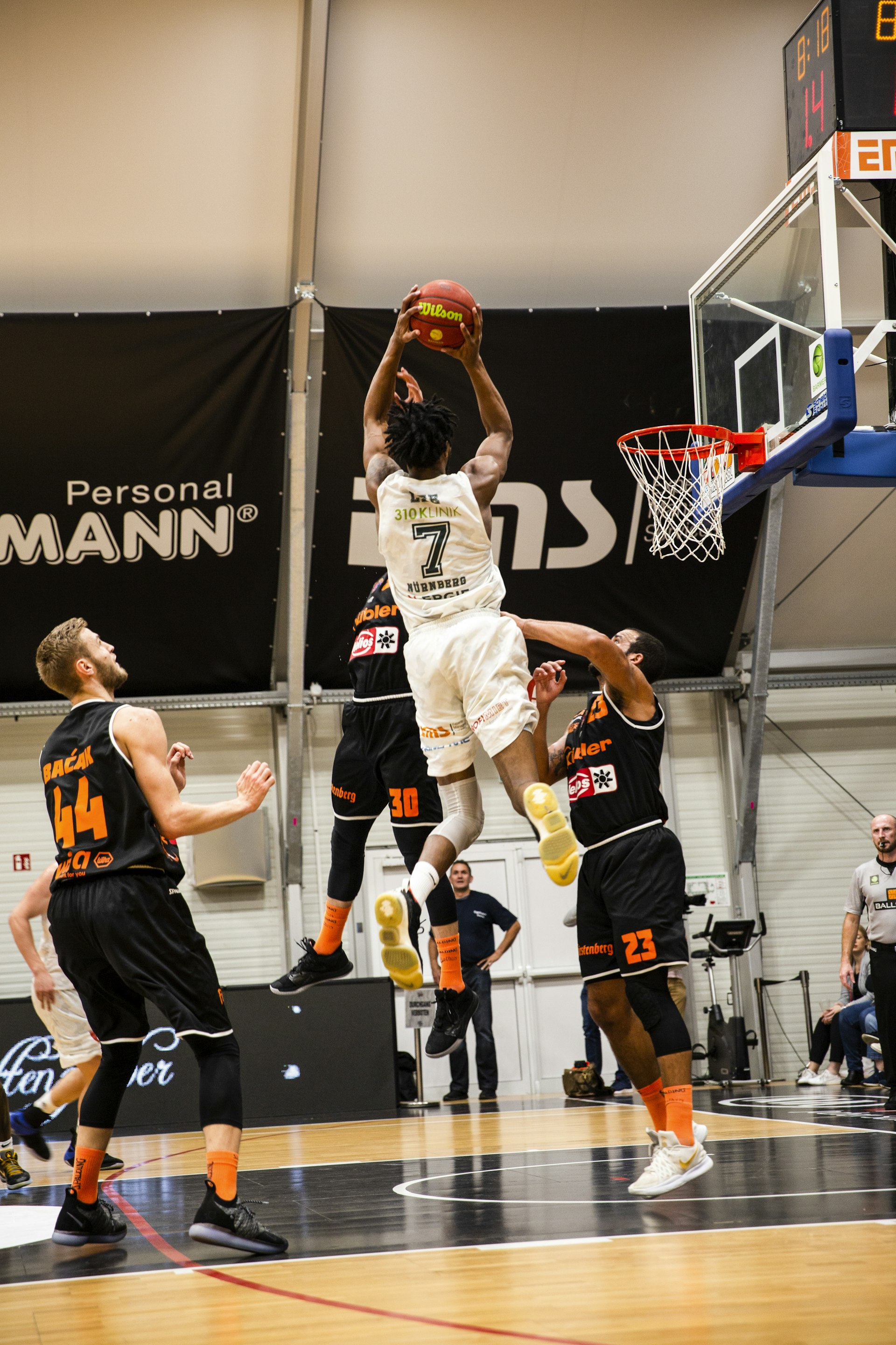 Basketball player driving to the basket